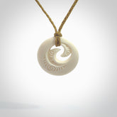A hand carved and engraved koru pendant carved for us by Yuri Terenyi. These are beautiful little pieces are emblematic of the well known and loved Koru design. Provided with an adjustable cord and packaged in a woven kete pouch. Free worldwide delivery.